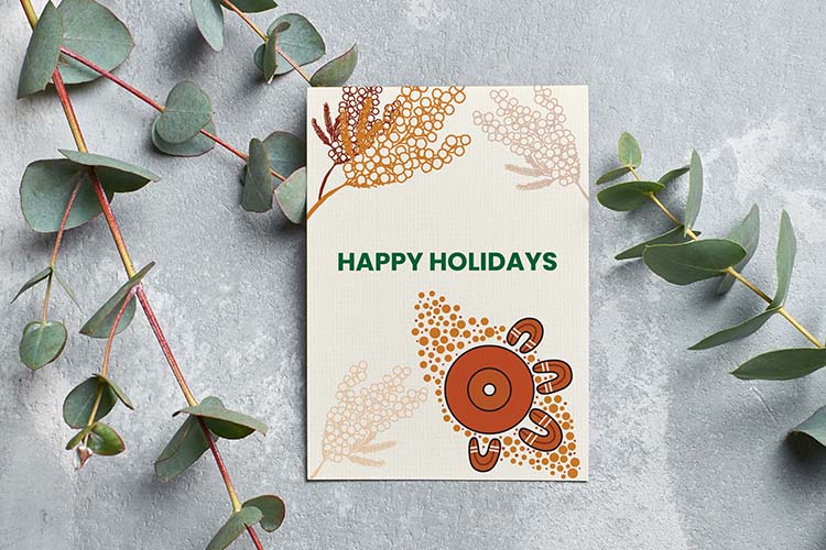 Card saying Happy Holidays with Aboriginal artwork around